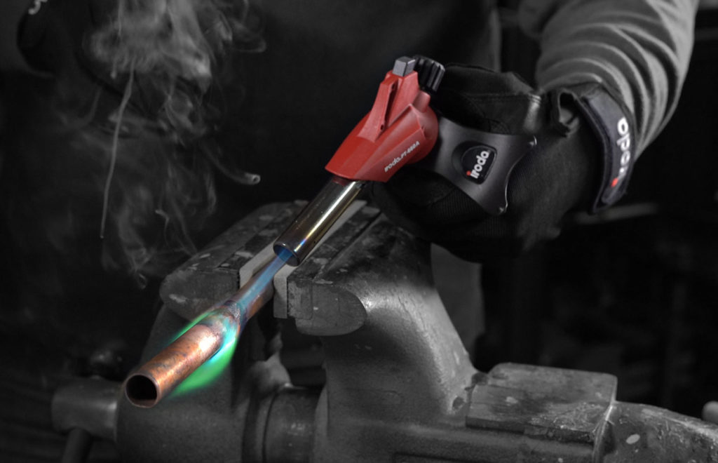 A Person is doing soldering by using Pro-Iroda's PT-660A Butane Cartridge Torch