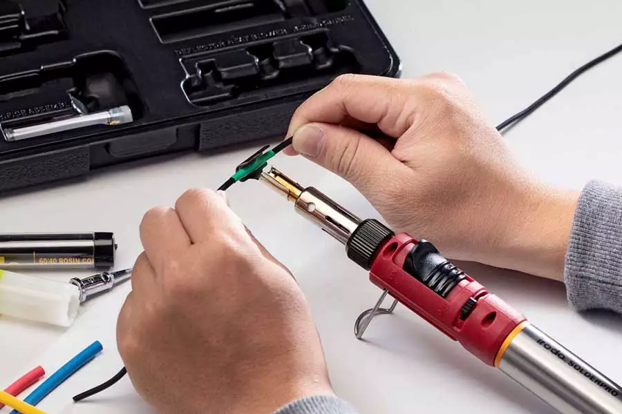 Using Pro-Iroda's SOLDERPRO 150K Professional Butane Soldering Iron Kit to do Heat Shrinking for a Wire